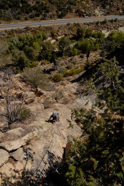 Patty Fienup climbs the delicate slab on the first half of Blue & Green, in the Central Gully of the Fortress.