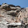 Ben Kiessel on the crux pitch.<br>
<br>
The Chopper Flake looms above.