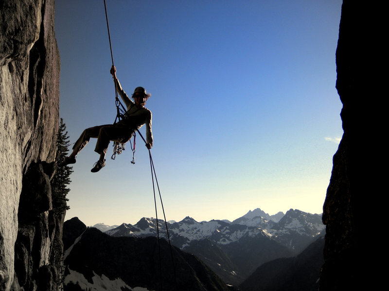 Rappelling over the chockstone