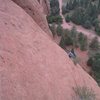 Pitch one, after making the crux move.  The climbing through here is easy but run-out.  Overall a pretty wild pitch as it traverses about 100 feet.