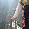 Ready! Poised to huck for the granite spike that makes the Tyrolean work, Sun Ribbon Arete, Temple Crag. Photo 1 of 3.