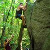 Me topp'n- Kendra luckily not crushed by large falling object.  Burma Boulders way over on left hand sde.  Don't know problem name.  It was easy V0 fun.  Super warm and humid Oct day and most of the Burma B's were overtly moist.