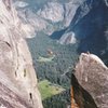 My partner Adalberto doing the Tyrolean traverse on Lost Arrow while I wait my turn (1985)