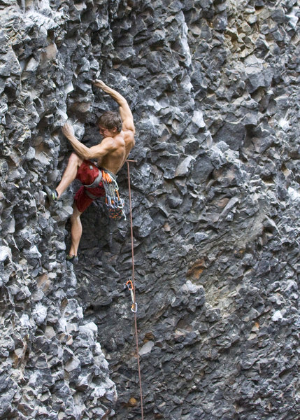 Curtis on the crux of The Roach (11a)