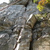 There is another set of bolts directly above the climb for top roping this one.  This photo was taken with the rope set up for Grandpa's Belay.