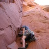 John Domaska beginning the first pitch of Duck For Cover. The route follows the dominant corner before traversing right to the prominent crux roof crack.