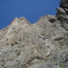 Jesse C scrambling up on easy terrain between the fifth and sixth pitch.