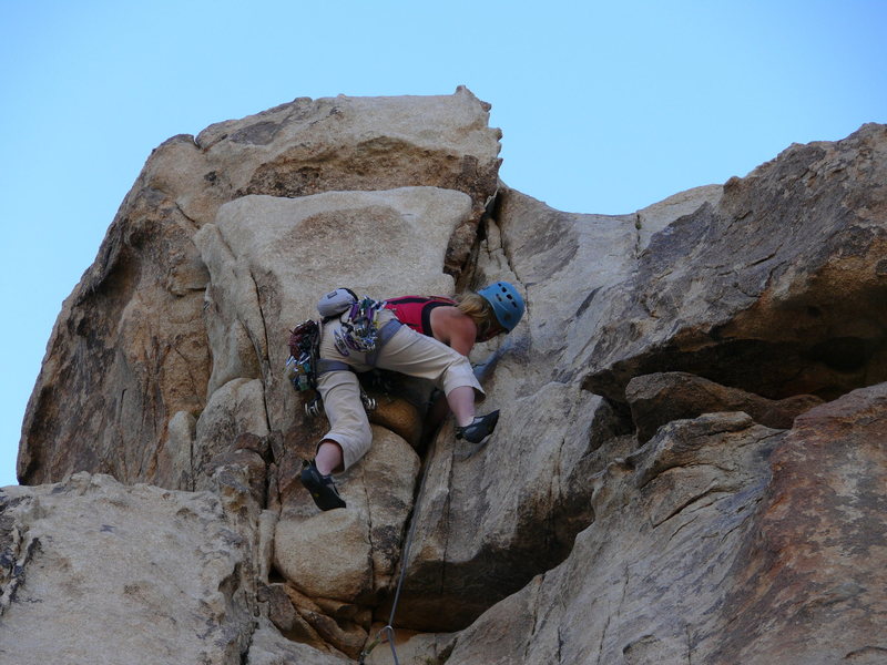 Pulling over the 2nd crux (?) at the top.