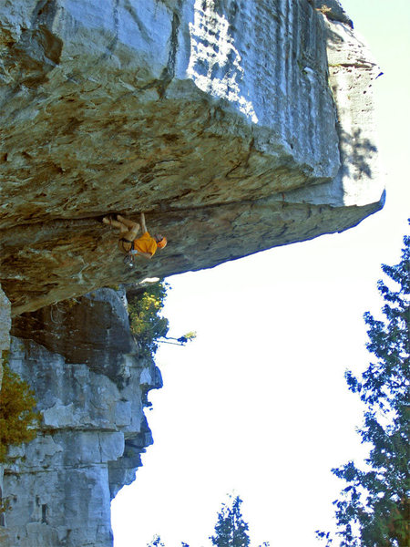 This monster lives on a bluff overlooking the Georgian Bay, with Lions Head in the distance. Easy but chossy climbing leads to the hand/fist crack that pinches down to fingers just before the lip. Unfortunately it seeps most of the season generally drying out around August.