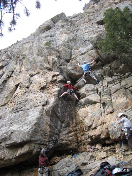 Bruno Hache starting up Is It Ready Yet...Moe (left), with another climber on Lazy Day (right).