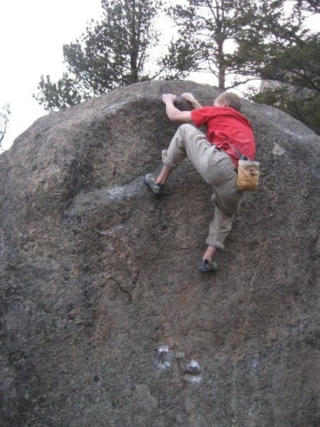 Alexis Sanders pulling on the finishing hold of Oatmeal Bath.  The starting holds are just below his right foot.