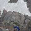 Douglas following the last vertical pitch on the casual route!  Climbers down below on the snow!