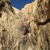 Lance on the steep section of the first pitch