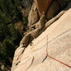 At the first bolt of El Supremo's 5.10 pitch, 2:00pm, Nov. 22nd.  Perfect conditions for sunny climbing.  The 5.4 approach pitch downclimbs the shady chimney, behind Marsha, to the bolts at the top of the thinnest groove (Violent Energy).<br>
<br>
Thanks to those who replaced the bolts on my favorite Colorado slab.