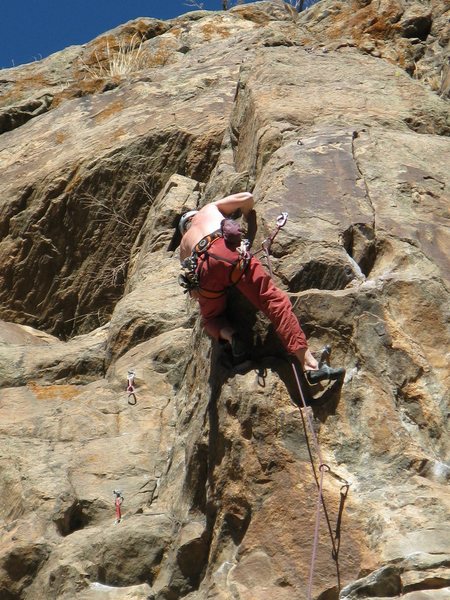 You start on the right, pull around left, and then work both sides of the arête.<br>
Photo by Ken Parker.