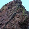 Me at the top of the Red Wall/Raptor in Cellophane. The bolts are visible here. My first 5.10 lead.