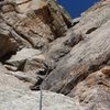 PITCH 3: Cranking Skills or Hospital Bills. Robb McLean opts for the former, stemming on the crux off width. Classic 5.9-Yosemite style! Pro is good, just bring big stuff.