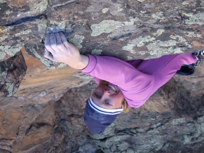 Christina working the holds over the top roof.