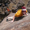 Eyeballing the top-out holds while moving through the steep finishing moves on Cholla Wall. December 2008.