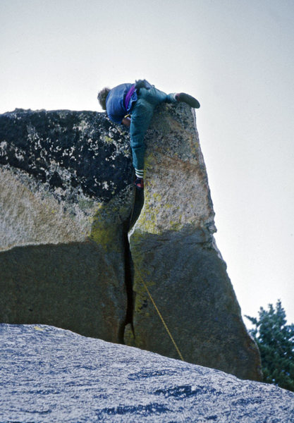 John Long on First Free Ascent of Paisano Overhang (5.12c), Suicide Rock, April, 1973 (Shot by Richard Harrison with a $25 Kodak Instamatic) Check out the red PAs and one-inch swami.Photo submitted with permission from JL. <br>
