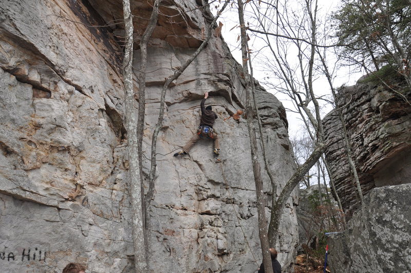 (crux) 2finger pocket for the left hand, move to a high jug with ur right.