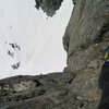 A few pitches up on Clyde Minaret, looking down into the snow field below...