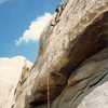 Rob Mulligan placing the second and last bolt on the FA of "Hallow Friction 5.10c".