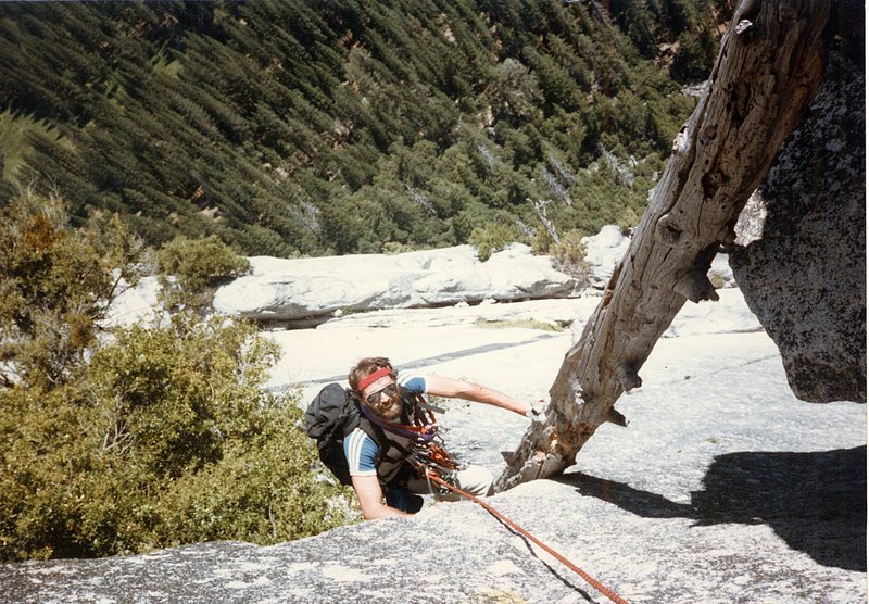 My brother Doug Odenthal on the shaky rotten log that used to be part of the Royal Arches route.