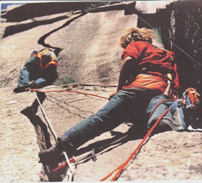 First Ascent:-July/1971.   Starting the Half Moon Crack belayed by John Bragg. Cannon Mt. New Hampshire