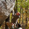 Willy trying the V5 campus problem @ the trailside area.