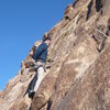 Brian on Charlotte's Web, 5.7 at Keyhole slabs, right of main canyon. Shallow croner and wander up crack passing 2 chockstones on left to bolted slab. Rap off slung boulder. 145ft.