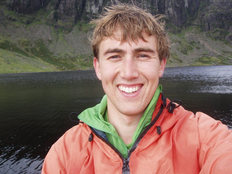 Me in the Lakes District, glad to see a little sun after a long and wet day running the Langdale Round.