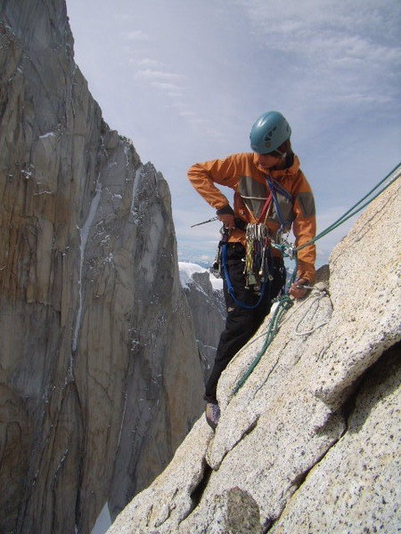 Jordon tricking out a rapell station on the way down from the summit.  