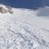 Passing avalanche debris at the base of Everest Ridge (temps had been warmer a few days before).