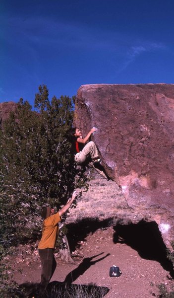 Von Anaya on the NW arete V1ish of the Unbeatable Boulder.