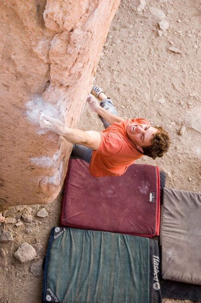 Matt NM sticking the big move on the arete. This move is somewhat blind and usually takes a couple of tries to get the acurracy to actually hit the hold.