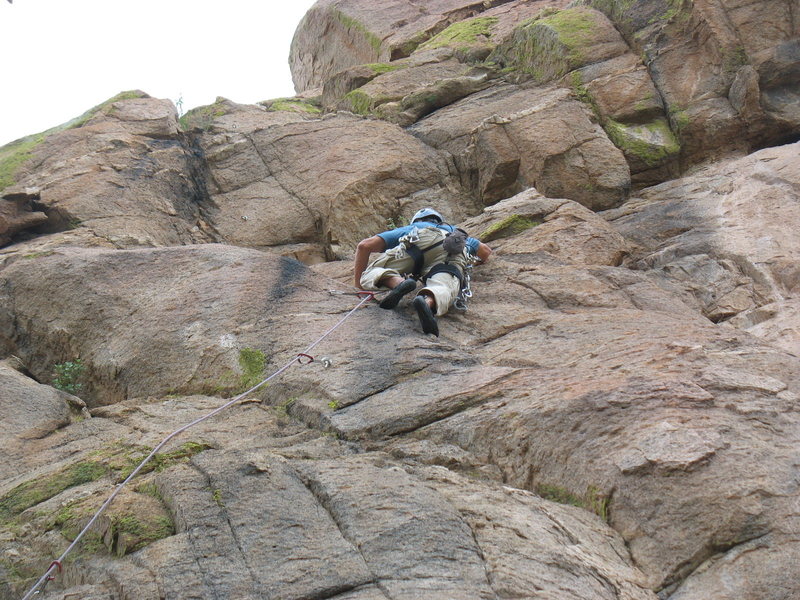 Just past the balance/slab crux. Good view of the upper half of the route.