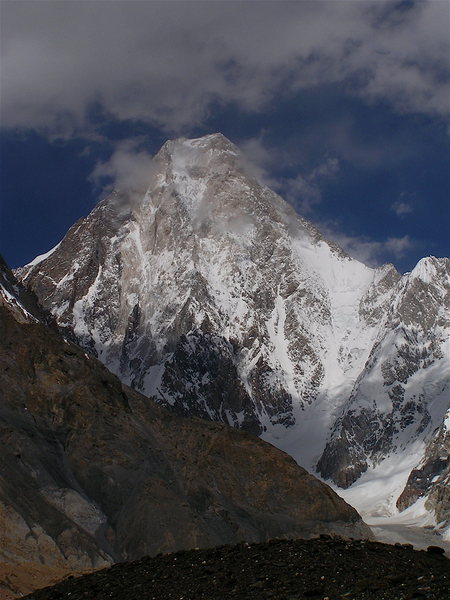 The shining wall of Gasherbrum IV is made up of marble and changes color throughout the day. At night it has an eerie bluish-white glow.