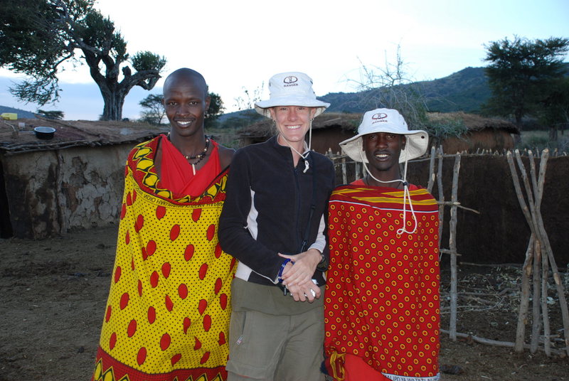 Leigh and a few Massai in Kenya, outside of the Massai Mara park.