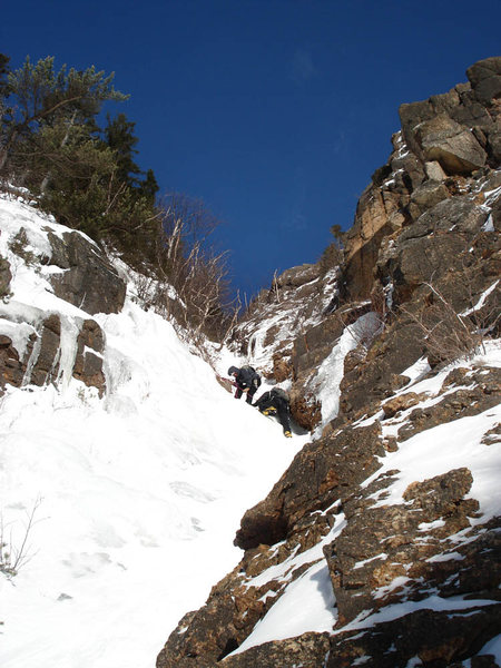 a team finishing up the upper section where we turned off to do the rock finish...