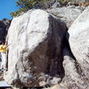 BH on FA of Sweet Angel V4, Inaugral Boulders.