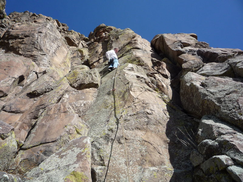 Resting below the crux moves.