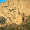 The S-Route takes the ramp up and right to the first large clump of trees, then left to the next large clump, then angles up and right in a gully to a final nice pitch leading to the top.