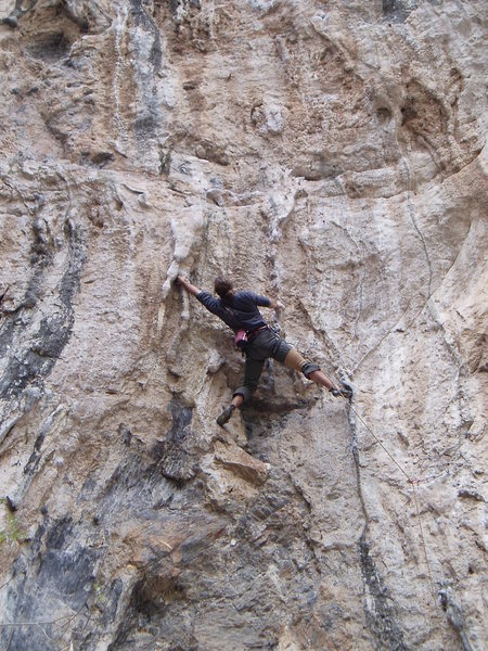 Simon starting the crux sequence on Blucifer