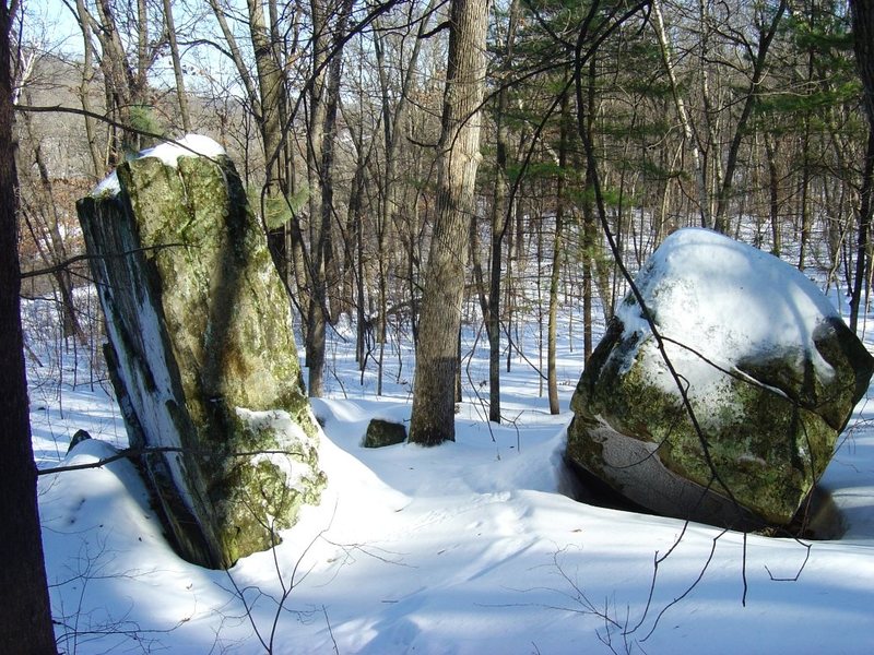 Maybe 15-16 feet tall?  Hard to tell since there was 2 feet of snow on the ground.  The overhanging face has some slopey ledges but I couldn't tell with all the frost on it if it was chossy or if there were any other features.  I presume it's been checked out before, it's not far out of the way.  