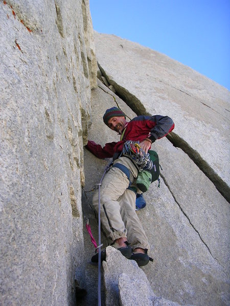 Bruce Lella starting the crux hand crack.  The quality of this crack makes up for the loose sections below.<br>
<br>
July, 2007, we day-tripped it from Paradise.  