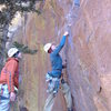 Trying to get a piece on the direct (5.10) start to the Yellow Spur.  A brown (or pink?) tri-cam is key here in what appears to be a flaring pin-scar.  Otherwise, be tall and fish in a tiny stopper (I had to have my partner place it as I was without said tri-cam).