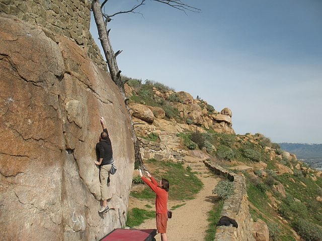 Ryan stretching out on King Bee (V1), Mt. Rubidoux