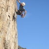 Rehearsals lead to fortune for Jesse Schultz as he sends the route. Photo by Aleix Serrat-Capdevila