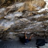 Morrison bouldering master Rufus Miller traverse training in the Black Hole, Morrison Wall, photo: Bob Horan.